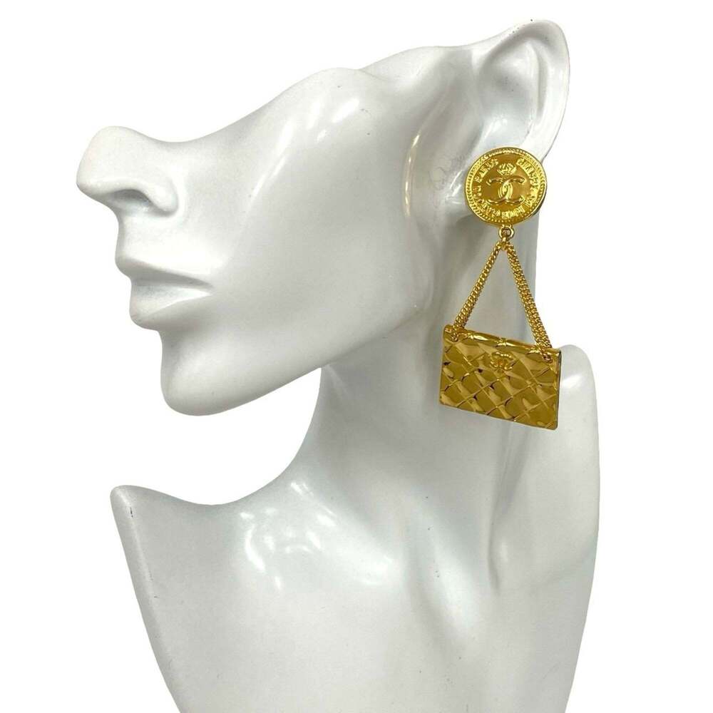 CHANEL Gold Logo Earrings